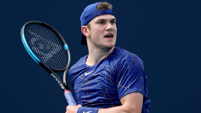 他却毫不掩 他却毫不掩